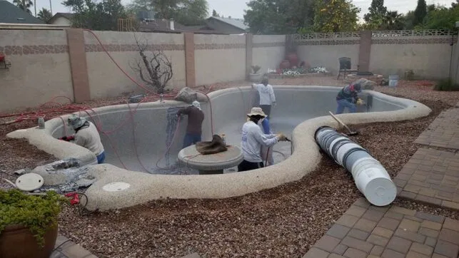Attached image file Team performing pool renovation in Gilbert